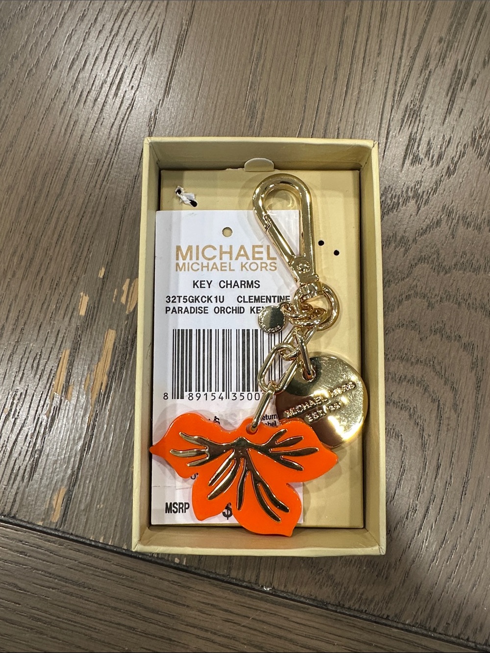 Michael Kors Gold-Tone Key Charm with Orange Enamel Flower